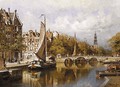 A view of the Prinsengracht, Amsterdam, with the Westertoren in the distance - Johannes Christiaan Karel Klinkenberg
