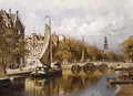 A view of the Prinsengracht, Amsterdam, with the Westertoren in the distance - Johannes Christiaan Karel Klinkenberg