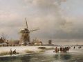 Figures on a frozen waterway with windmills on the river bank - Lodewijk Johannes Kleijn