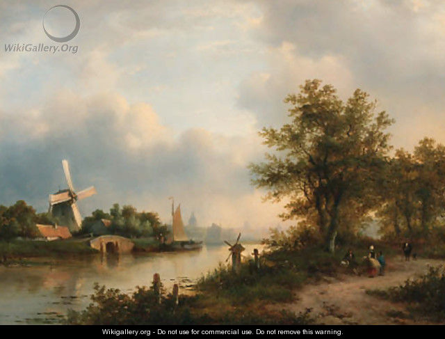 A river landscape in autumn with villagers on a path along the water, a town beyond - Lodewijk Johannes Kleijn