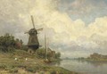 Windmill by a river - Julius Jacobus Van De Sande Bakhuyzen