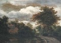 A wooded landscape with a traveller on a path by a pond - Jacob Van Ruisdael