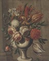 Roses, parrot tulips, chrysanthemums and other flowers in a vase on a ledge - Italian School