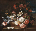 Roses, Narcissi, a Hyacinth, Primulae, Jasmine, Carnations and other Flowers in a wicker Basket on a stone Ledge, a Landscape beyond - Jean-Baptiste Monnoyer