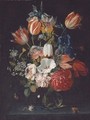 Roses, tulips, irises and other flowers in a glass vase with a rose, a caterpillar and two insects, on a stone ledge - Jan Pauwel II the Younger Gillemans