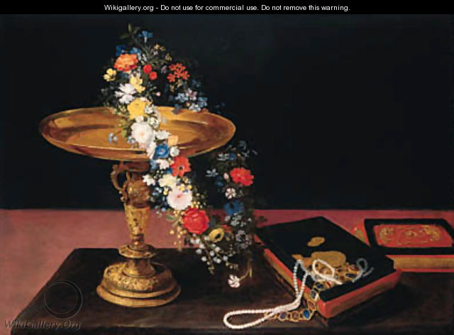 A garland of mixed flowers around a silver gilt tazza and a casket on a table - Jan, the Younger Brueghel