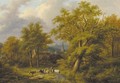 A wooded landscape with a herdsman with flock - Jan Evert Morel