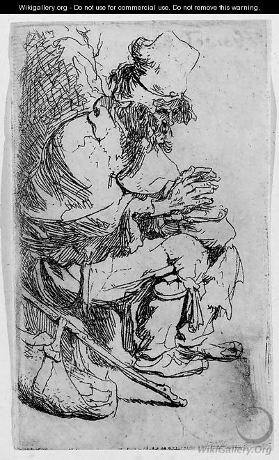 A Beggar seated warming his Hands at a Chafing Dish - Rembrandt Van Rijn
