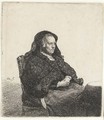 The Artist's Mother seated at a Table looking right Three-quarter Length - Rembrandt Van Rijn