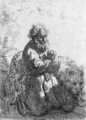 Saint Jerome kneeling in Prayer, looking down - Rembrandt Van Rijn