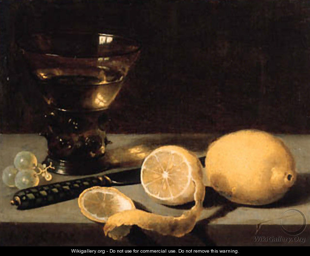 A lemon, a partly peeled lemon, grapes, a roemer and knife on a stone ledge - Pieter Claesz.