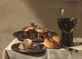 A roemer, a pie with a spoon and a peeled lemon on pewter plates - (after) Willem Claesz. Heda