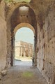 A figure standing before a Roman arch - Giampietrino