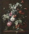 Roses, morning glory and other flowers in a glass vase on a wooded ledge - Simon Pietersz. Verelst