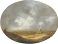 An extensive landscape with peasants harvesting wheat by a windmill, an estuary beyond - School Of Haarlem
