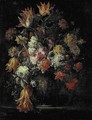 Tulips, carnations and other flowers in an urn on a ledge - Margherita Caffi