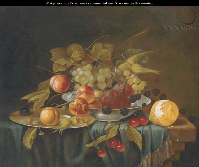 A bowl and a salver of grapes, plums and blackberries by cherries and a lemon on a draped table. - (after) George Forster