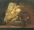 Grapes, apples, a peach and a lemon in a wicker basket on a wooden ledge - (after) Adriaen Van Utrecht