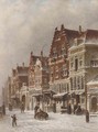 Winter a sunlit street in a Dutch town - Pieter Gerard Vertin