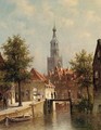 A capriccio view of Alkmaar in summer - Pieter Gerard Vertin
