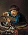 A boy standing by a table laden with fish - Petrus Staverenus