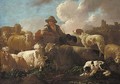 A shepherd resting with sheep, goats and dogs before a hillside town - Philipp Peter Roos