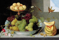 Grapes in a blue and white porcelain bowl with peaches on a gold tazza, with a melon, shells and carnations on a stone ledge - Peter Paul Binoit