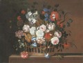 Roses, tulips, morning glory, carnations, delphinium, primrose, narcissi and other flowers in a basket on a stone ledge - Pieter Hardime