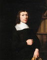 Portrait of a young man, standing three quarter length by a bookcase, wearing dark costume and a lace collar, holding gloves - Nicolaes Maes
