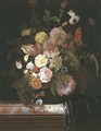 Roses, peonies, tulips and other flowers, in a glass bowl standing on a veined marble slab, the corner which is covered in a plum-colored silk drapery - Nicolaes Lachtropius