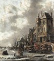 A Winter Scene With Figures Skating On A Frozen River Before Houses - Thomas Heeremans