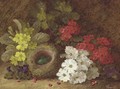 Still life of primroses, primulas, pansies, a bird