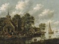 An inn by a river with moored sailing vessels and a washerwoman on a jetty - Thomas Heeremans