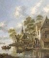 An estuary with figures in ferryboats before a tavern - Thomas Heeremans