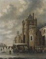 A winter landscape with townsfolk skating and sledging on a frozen river before a castle - Thomas Heeremans
