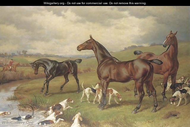 A hunting scene, with horses and hounds in the foreground, and a hunt beyond - William H. Hopkins