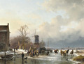 An extensive winter landscape with numerous villagers on the ice - Andreas Schelfhout