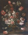 Tulips, carnations, chrysanthemum, narcissi, roses and other flowers in an urn on a marble ledge - Andrea Scacciati