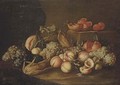 Peaches, grapes, corn on the cob, pomegranates and a melon on a stone floor - Alexander Coosemans