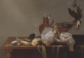 A blue tit, a red finch, a patridge, a kingfisher, and other dead birds on a half draped table, with a glass and silver rimmed jug - Alexander Adriaenssen