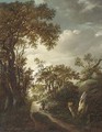 A wooded landscape with a man carrying water on a track, two figures near a gate beyond - (follower of) Ruisdael, Jacob I. van