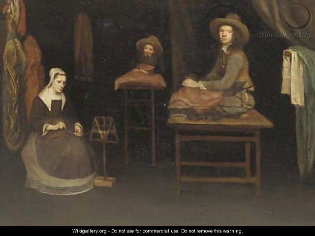 An interior with a family making cloth - (after) Esaias Boursse