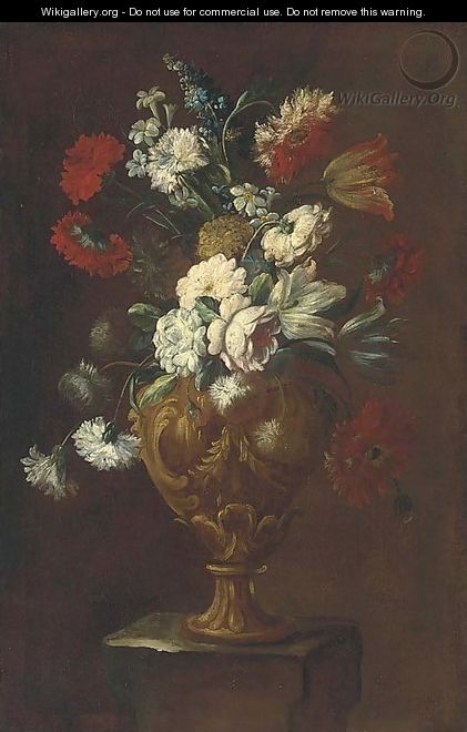 Parrot tulips, roses, carnations and other flowers in a sculpted vase on a pedestal - (after) Elisabetta Marchioni
