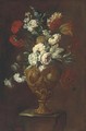 Parrot tulips, roses, carnations and other flowers in a sculpted vase on a pedestal - (after) Elisabetta Marchioni