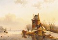 A tower by a frozen lake - (after) Andreas Schelfhout