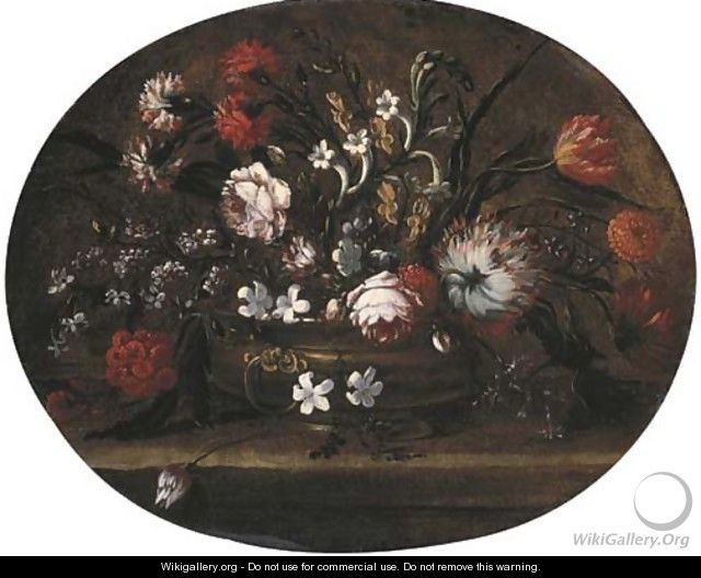 Roses, tulips, carnations and other flowers in a bronze vase on a ledge - (after) Andrea Belvedere