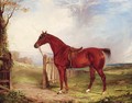 A saddled chestnut Hunter in an extensive Landscape with a Hunt beyond - (after) Thomas W. Bretland