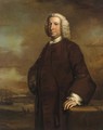 Portrait of a gentleman, standing three-quarter-length, in a brown coat and waistcoat, in a river landscape with a ship beyond - (after) Thomas Hudson