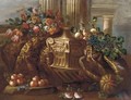 Mmixed flowers, grapes, pears, peaches, a melon and a carpet - (after) Pietro Navarra