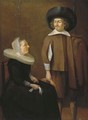 An elegant couple in an interior - (after) Pieter Codde